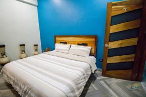 Postel nebo postele na pokoji v ubytování isel magic hotel
