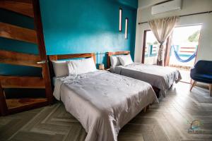 Postel nebo postele na pokoji v ubytování isel magic hotel