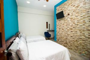 Postel nebo postele na pokoji v ubytování isel magic hotel