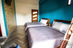 Postel nebo postele na pokoji v ubytování isel magic hotel