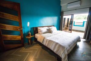 Postel nebo postele na pokoji v ubytování isel magic hotel