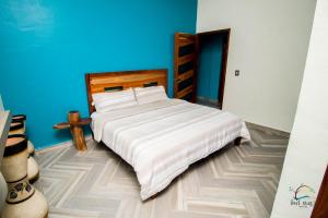 Postel nebo postele na pokoji v ubytování isel magic hotel