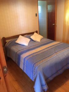 Ένα ή περισσότερα κρεβάτια σε δωμάτιο στο Casa Chuden