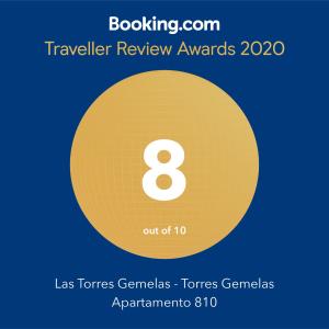 a yellow circle with the number eight on it at Las Torres Gemelas - Torres Gemelas Apartamento 810 in Acapulco