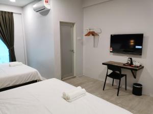 Voodi või voodid majutusasutuse L Hotel toas