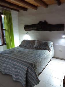 Una cama o camas en una habitación de Los Niyus