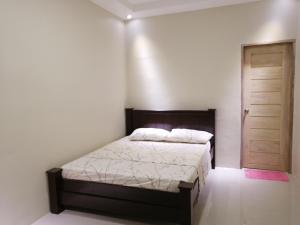 Postel nebo postele na pokoji v ubytování Sierra Casas Hotel
