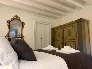 Posteľ alebo postele v izbe v ubytovaní Cavour44 - Palazzo Canossa