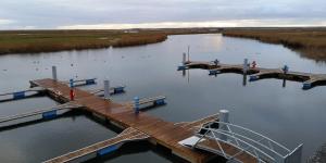 an aerial view of a dock on a body of water at Pod Kasztanem in Świnoujście