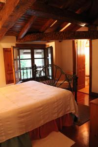 Ein Bett oder Betten in einem Zimmer der Unterkunft Mañuko Benta