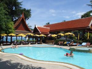 a group of people in a swimming pool at a resort at Bill Resort in Lamai