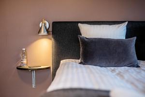 Postel nebo postele na pokoji v ubytování Hotel Sidesporet