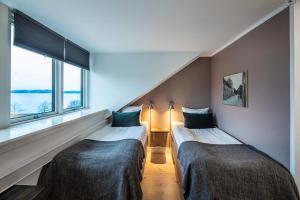 Postel nebo postele na pokoji v ubytování Hotel Sidesporet
