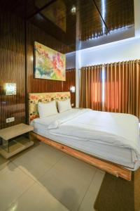 Katil atau katil-katil dalam bilik di Ocean View Residence