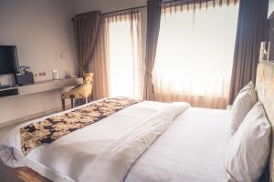 Katil atau katil-katil dalam bilik di Ocean View Residence