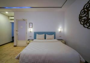 Katil atau katil-katil dalam bilik di Ocean View Residence