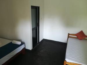 Postel nebo postele na pokoji v ubytování Hotel Star White - Negombo