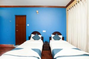 Katil atau katil-katil dalam bilik di Hotel Green Horizon