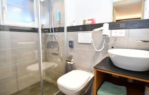 Koupelna v ubytování Hotel Elite