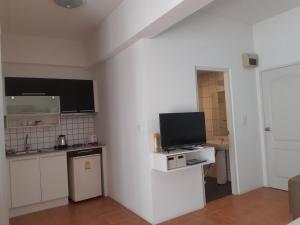 Kuchyň nebo kuchyňský kout v ubytování Avatara Condo B24 by malai