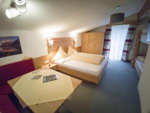 Letto o letti in una camera di Gästehaus Panorama