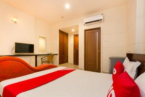 Ένα ή περισσότερα κρεβάτια σε δωμάτιο στο Hoa My Hotel