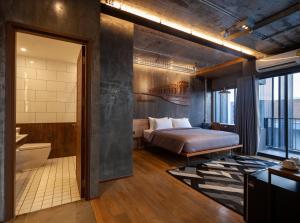 Postel nebo postele na pokoji v ubytování Navakitel Design Hotel