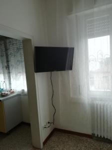 TV a/nebo společenská místnost v ubytování Affittacamere Mark