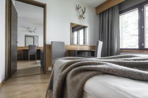 Postel nebo postele na pokoji v ubytování Lapland Hotels Hetta