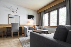 TV a/nebo společenská místnost v ubytování Lapland Hotels Hetta + 37 fotografií