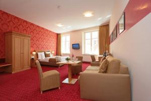 TV a/nebo společenská místnost v ubytování Romantik Hotel Scheelehof Stralsund