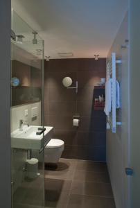 Vannituba majutusasutuses Hotel Allalin Saas-Fee