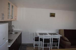 Kuchyň nebo kuchyňský kout v ubytování Apartments Japuncic
