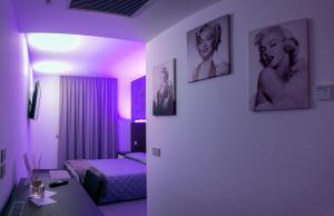 Postel nebo postele na pokoji v ubytování BRIGANTE SUITES