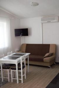 TV a/nebo společenská místnost v ubytování Apartments Japuncic