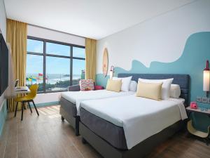 ibis Styles Vung Tau客房内的一张或多张床位