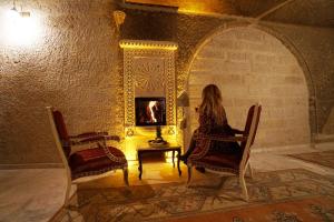 Posezení v ubytování Roma Cave Suite