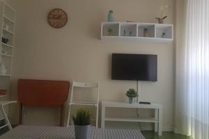 Telewizja i/lub zestaw kina domowego w obiekcie BONITO APARTAMENTO TRIANA-LOS REMEDIOS