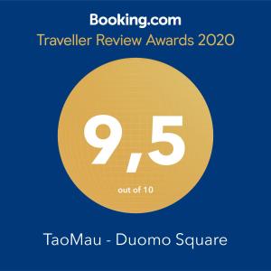 a yellow circle with the number nine and the text travelling review awards at TaoMau - Duomo Square in Taormina