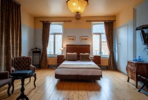 Posteľ alebo postele v izbe v ubytovaní Charme Hotel Hancelot