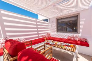 Uma área de estar em O Lofos Luxury Boutique Suites