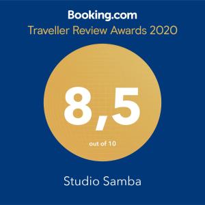 a yellow circle with the number eight and the text travelling review awards at Studio Samba in Saly Portudal