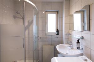 A bathroom at Dimai House No 15 Dornbirn Zentrum