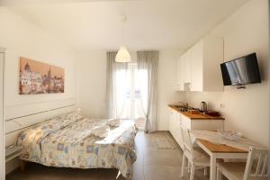 Postel nebo postele na pokoji v ubytování Casa cielo&mare