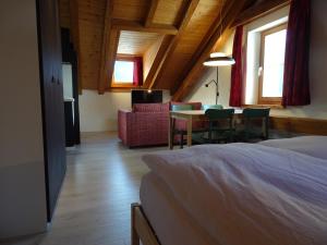 Katil atau katil-katil dalam bilik di B&B Chasa Arfusch