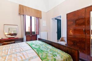 A bed or beds in a room at La dimora del Cavaliere di Squinzano
