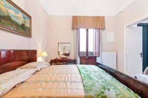 A bed or beds in a room at La dimora del Cavaliere di Squinzano