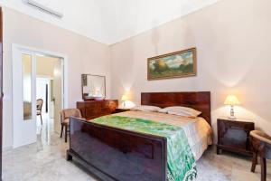 A bed or beds in a room at La dimora del Cavaliere di Squinzano