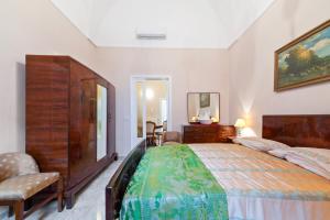 A bed or beds in a room at La dimora del Cavaliere di Squinzano
