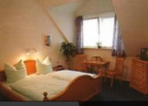 Postel nebo postele na pokoji v ubytování Gasthof Frankenstuben + 20 fotografií